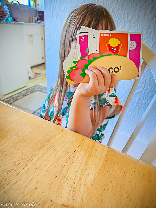 Lily Showing off Taco Vs Burrito Colorful Cards (2)